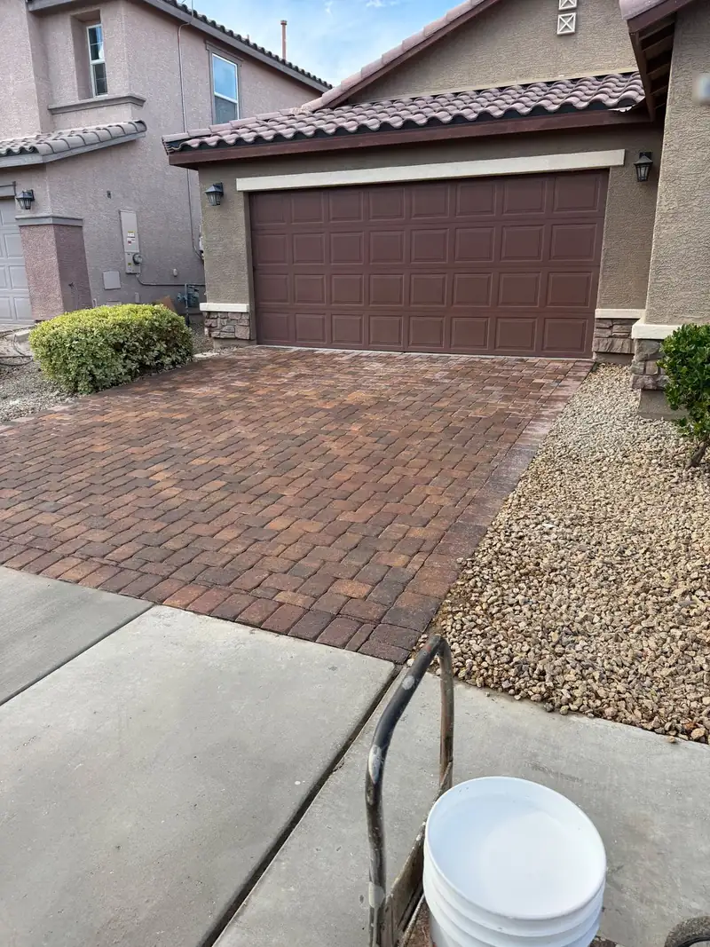 Driveway with fresh sealer going down
